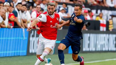 Arsenal defender Sead Kolasinac in action against Real Madrid forward Lucas Vazquez. EPA