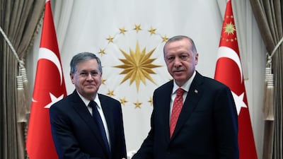 President Recep Tayyip Erdogan greets David Satterfield, the new US ambassador to Turkey, at the Presidential Palace in Ankara on August 28, 2019. Presidential Press Office via Reuters