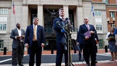 Kevin Downing, center, with Richard Westling, left, and Thomas Zehnle, right, with the defense team for Paul Manafort. AP