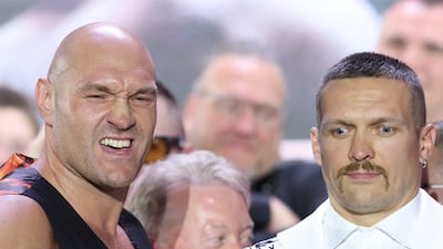 British boxer Tyson Fury, left, and Oleksandr Usyk of Ukraine pose after attending a press conference in Riyadh, Saudi Arabia. EPA