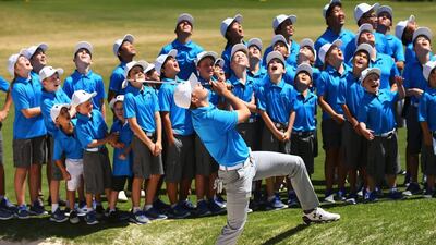 Jordan Spieth of the United States plays a bunker shot as he hosts a golf clinic for junior Australian golfers ahead of the 2015 Australian Open at The Australian Golf Course in Sydney, Australia. Matt King / Getty Images