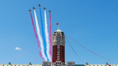Fighter jets pass over the presidential office building in Taipei, Taiwan, during an aerial performance. EPA