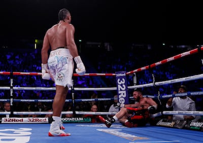 Joe Joyce sends Joseph Parker to the canvas in the 11th round to claim the stoppage win. Reuters