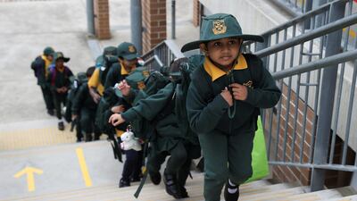 Children return to campus for the first day as New South Wales public schools fully reopen amid the easing of the coronavirus restrictions at Homebush West Public School in Sydney, Australia. Reuters