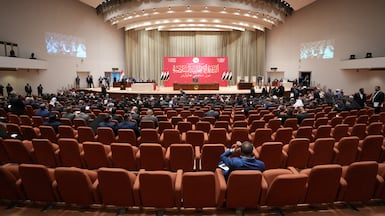 Iraqi politicians attend the first session of the newly elected Parliament on December 29. Reuters