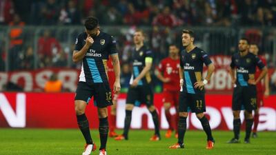 Arsenal’s Olivier Giroud reacts after his team allow the fourth goal against Bayern Munich on Wednesday in their Champions League loss. Michael Dalder / Reuters