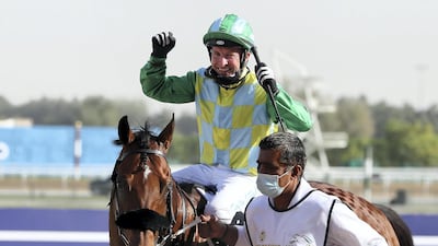 Secret Ambition, ridden by Tadhg O’Shea, won the Godolphin Mile during the Dubai World Cup at Meydan. Pawan Singh / The National