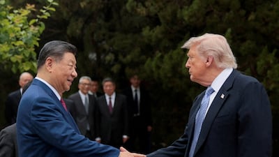 US President Donald Trump with Chinese President Xi Jinping in Beijing in May. The two leaders face renewed tensions over China’s role as Iran’s biggest oil buyer. Reuters