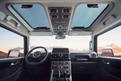 Inside, the aircraft-inspired switches and wipe-clean surfaces are designed for adventure rather than valet parking. Photo: Ineos