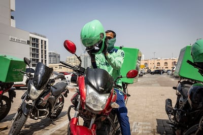 A Careem captain sets off to complete another delivery. Antonie Robertson / The National