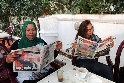 Tunisians the morning after the Tunisian presidential election on Sunday. Moahmed Messara / EPA