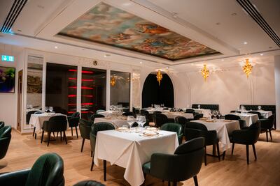 Frescoes on the ceiling transport guests to Italy. Photo: Argianos