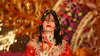 Radhe Maa is being judged not as much for her “credentials” as her attire.
