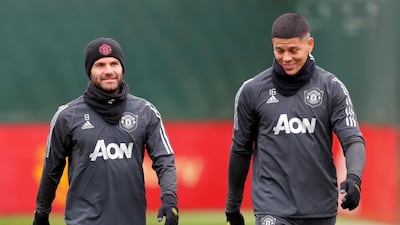 Marcos Rojo, right, has not played for Manchester United since November. PA