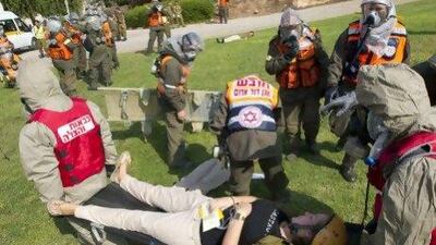 Israeli soldiers and rescue teams take part in defence drill simulating a missile attack at a school in Holon, near Tel Aviv.
