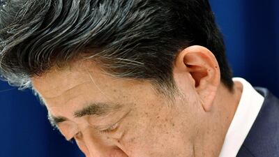 Japan's Prime Minister Shinzo Abe bows his head as he says he is stepping down during a news conference at the prime minister official residence in Tokyo, Japan August 28, 2020. Reuters