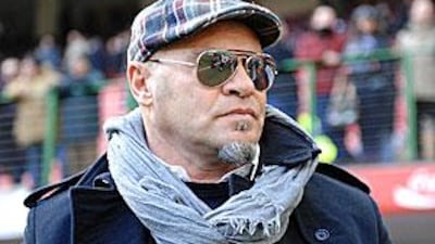 Serse Cosmi, the Livorno coach, looks on during his team's Serie A draw with AC Milan.