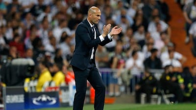 Real Madrid coach Zinedine Zidane applauds during their Champions League win over Manchester City on Wednesday night. Francisco Seco / AP / May 4, 2016