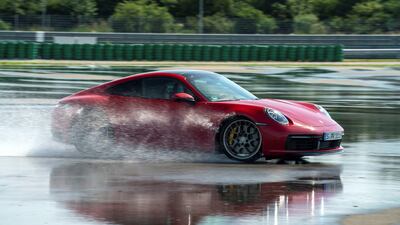 The Cabriolet’s roof features magnesium-layered fabric and can be opened and closed at up to 50km/h. Courtesy Porsche