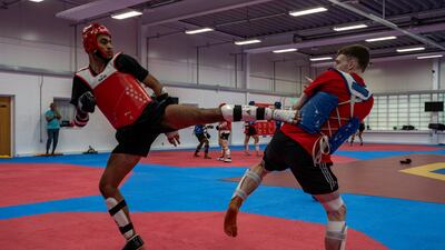 Farzad Mansouri, left, trains with GB World Champion and Tokyo Olympic silver medallist, Bradley Sinden, at the National Taekwondo Centre in Manchester, UK.
