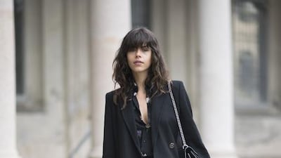 If you’re looking to nail the androgynous look, you may as well take 80 per cent of the colour out of your wardrobe. Timur Emek / Getty Images