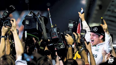 Turning on my heels and running away from the throng of photographers snapping the new drivers’ world champion may seem like a foolhardy choice. Prior to Nico Rosberg being hoisted high by his mechanics I decided to get the shot you see here. The feeling of elation I get when a shot comes together in the viewfinder makes all the effort worthwhile. Shot ‘in-the-can’ I turned away and punched the air every bit as hard as the celebrating Mercedes driver!
