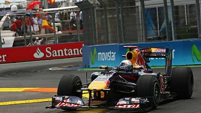 Sebastian Vettel in action in Valencia yesterday in his Red Bull-Renault on the way to victory in the European Grand Prix.