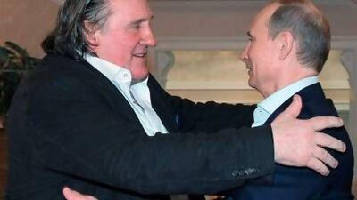 French actor Gerard Depardieu, left, greets Russian President Vladimir Putin after his arrival at Putin’s residence in Sochi.