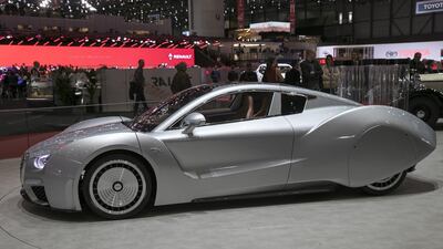 The Hispano Suiza Carmen electric supercar sits on display at the motor show. Stefan Wermuth / Bloomberg