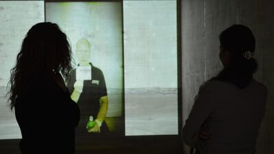 A visitor at the opening of the Huna Al Emarat exhibition at Ductac, Dubai. Courtesy of Ductac