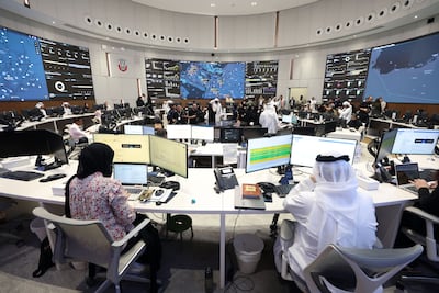 The control room in Abu Dhabi, which works in tandem with smart ambulance crews. Chris Whiteoak / The National