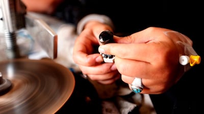 Safa al-Faqih crafts a stone in the old city of the capital, Sanaa, on April 18, 2018. Mohammed Huwais / AFP Photo