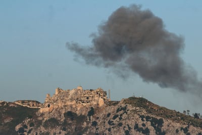 Smoke rises near Beaufort Castle after it was captured by Israeli forces. Reuters