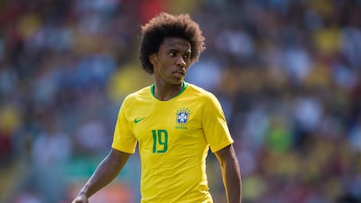 10 Brazil || The look: Brazil have finally paired their famous yellow shirts with a lighter shade of blue for their shorts. The difference is subtle, but they look more like the 80s Brazil. || Would I wear it? No, not both together. || Photo: Peter Powell / EPA