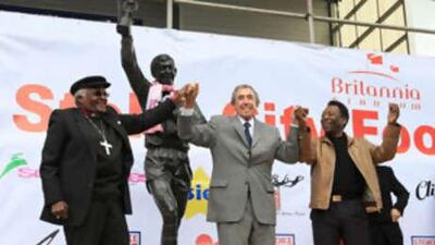 Gordon Banks is flanked by Archbishop Desmdond Tutu and Pele at the unveiling of his statue at his former club Stoke's Britannia Stadium.