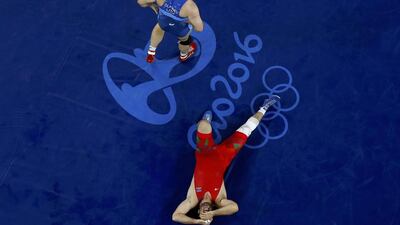 Jamaladdin Magomedov of Azerbaijan reacts after the match against Tervel Dlagnev of USA in the men’s freestyle wrestling 125kg quarter-finals at the Rio 2016 Olympic Games on August 20, 2016 in Rio de Janeiro, Brazil. Toru Hanai / Reuters