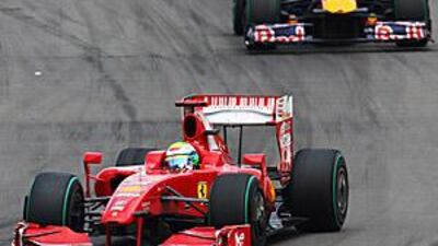 Felipe Massa leads Red Bull's Sebastian Vettel on his way to third place in Germany. Vettel eventually finished ahead of the Brazilian.