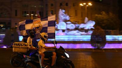 Real Madrid´s fans celebrate winning the league title at Cibeles square in Madrid. AFP