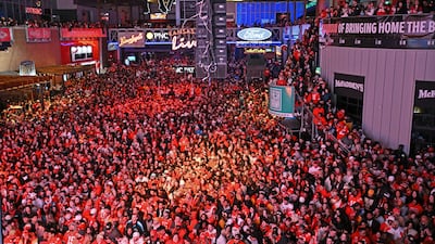 Kansas City Chiefs fans gather during a Super Bowl 58 watch party at the Power and Light District in Kansas City, Mo. AP