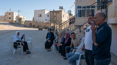 Mohammed and his extended family outside their homes in Dahariya