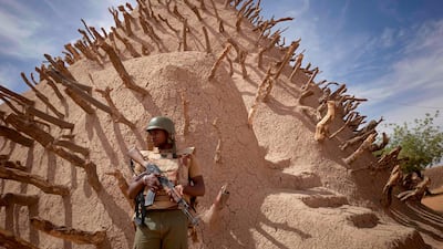 A Malian soldier guards the Tomb of Askia, an archaeological site in Gao. AFP