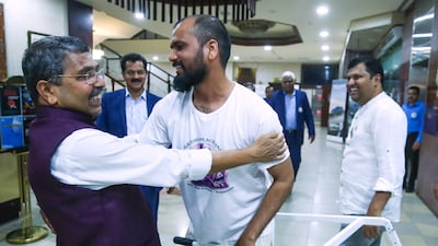 Nitin Sonawane is welcomed by VTV Damodaran, founder of a Gandhi group