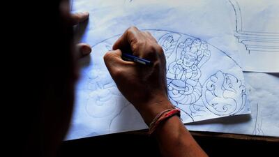 Mr Shilpakar is determined to do all he can to help Nepal rebuild its architectural treasures. Prakash Mathema / AFP