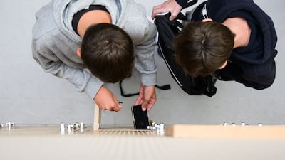 President Emmanuel Macron is urging the senate to pass into law a bill banning under-15s from social media. AFP