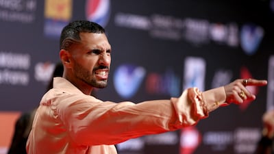 Egyptian actor Hassan Abouelrouss on the red carpet. Photo: El Gouna Film Festival; AFP