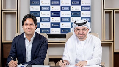 Akash Shah, chief growth officer at BNY Mellon and Ahmed Al Qassim, group head of corporate and institutional banking of Emirates NBD, at the signing ceremony. Photo: BNY Mellon