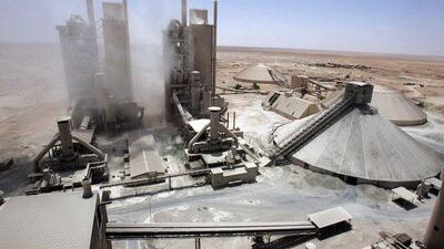 A cement factory operates in the southern province of Kerbala, Iraq. Mushtaq Muhammed / Reuters