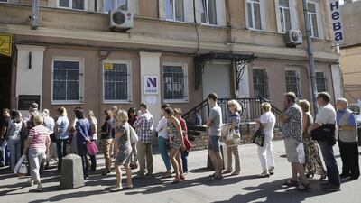 Clients queue outside the office of tour operator Neva as they attempt to get back their money for paid vacation packages. Neva, one of the five Russian tour operators which closed shop recently, had the greatest number of tie-ups with agencies abroad, including in the UAE. Reuters