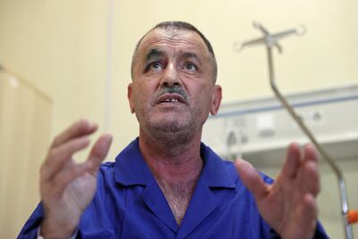Zulfugar Asadov, a flight attendant on the Azerbaijan Airlines plane that crashed in Kazakhstan, speaks from a hospital in Baku, Azerbaijan. Reuters