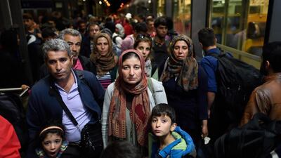 Around 500 refugees arrive at Saalfeld train station in eastern Germany after travelling from Hungary via Austria. From Saalfeld, they travelled by bus to other destinations in the state of Thueringen. Hendrik Schmidt / EPA